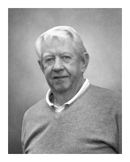John F Wollacott
